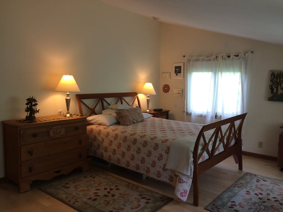 Nice, quiet queen bedroom with three big windows overlooking conservation land.