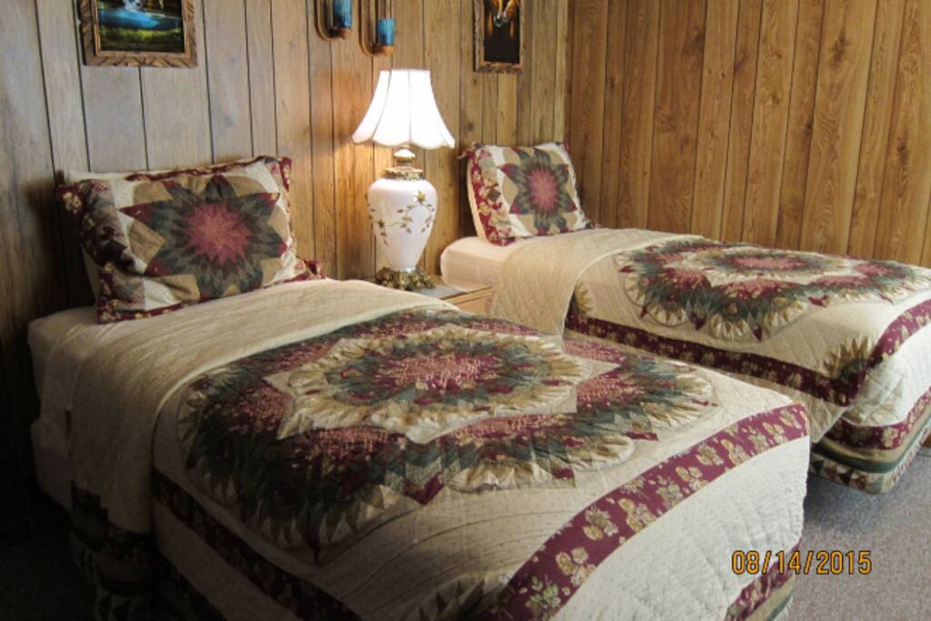 Bedroom 1 with two single beds.