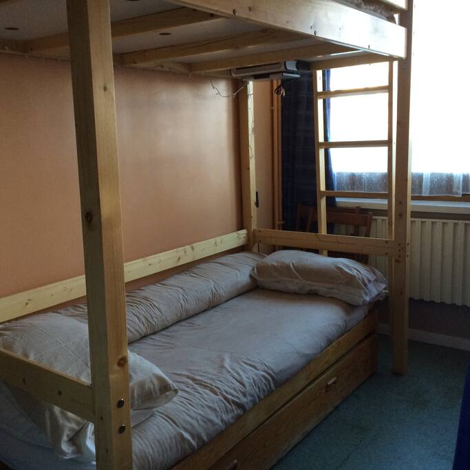 Bed settee with over head bunk