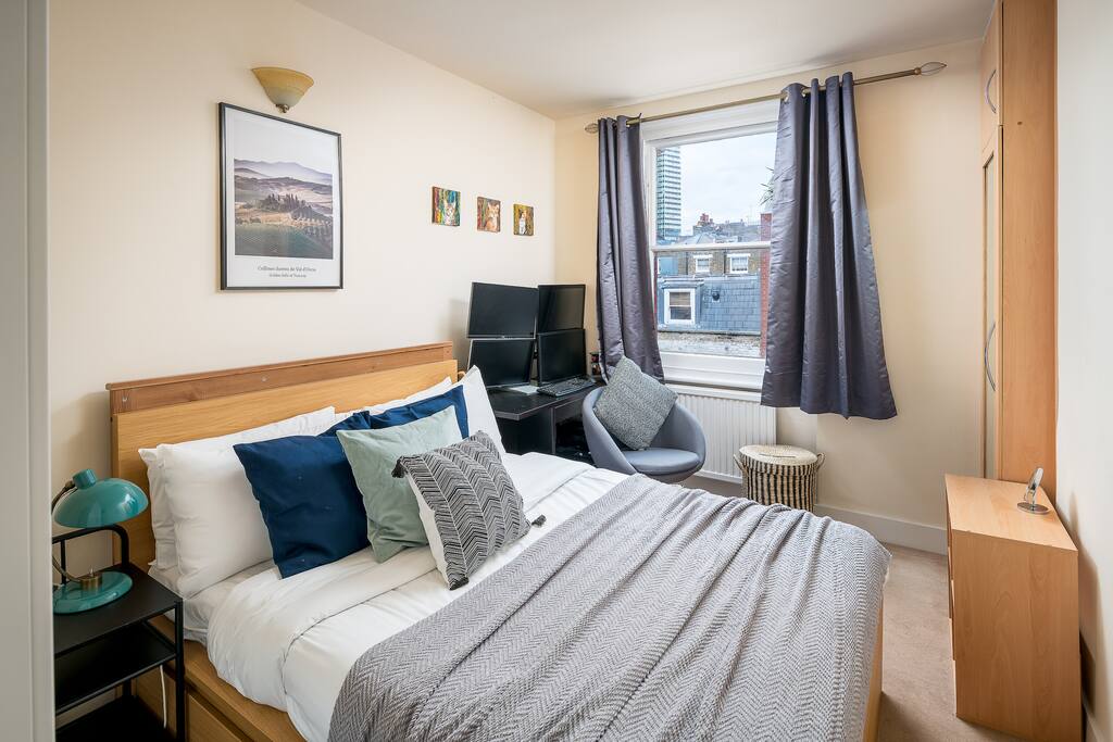 The first bedroom is spacious and light.