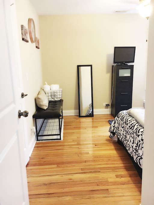 Entrance to bedroom. Tv is provided with basic channels.