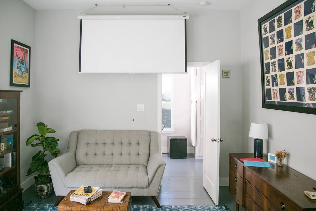 From the bed watch Netflix, Hulu, HBO or Amazon Prime on the projector screen.