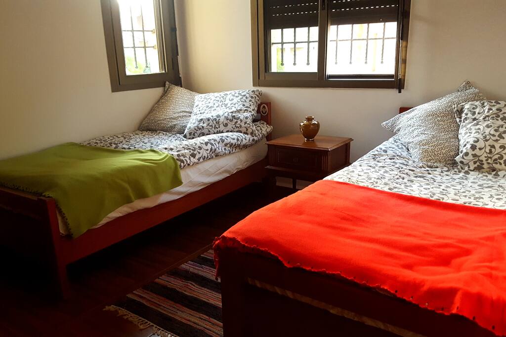 Room n°1: Bright and spacious with two single beds, one big dressing and one side-bed shelf; with a view over the mountains.