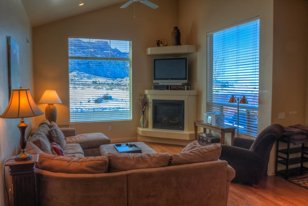 Living room with spectacular Moab Rim views from the couch.