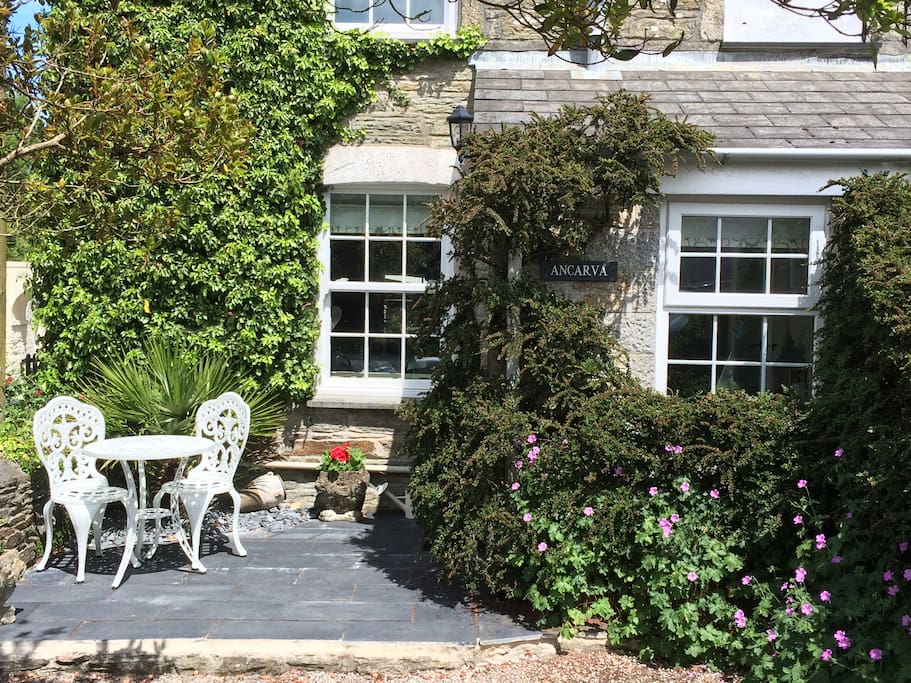 Enjoy the late afternoon sun and watch village life go by.