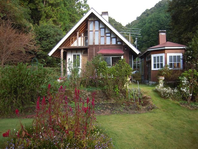 Log guest house with beautiful lawn garden