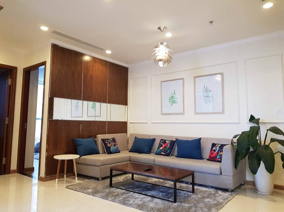 Spacious living room with a big sofa couch
