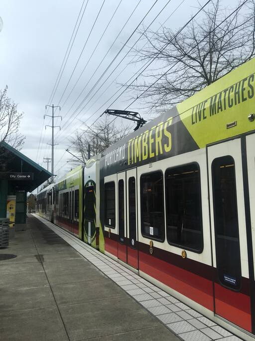 Head down the path and make a right turn! You can hear the faint hum of the light rail as it comes to your Quatama station. 2.50 one way or 5 dollars for day connecting to all of metro Portland.