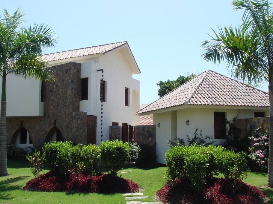 Side view of the villa, laundry yard entrance to the house