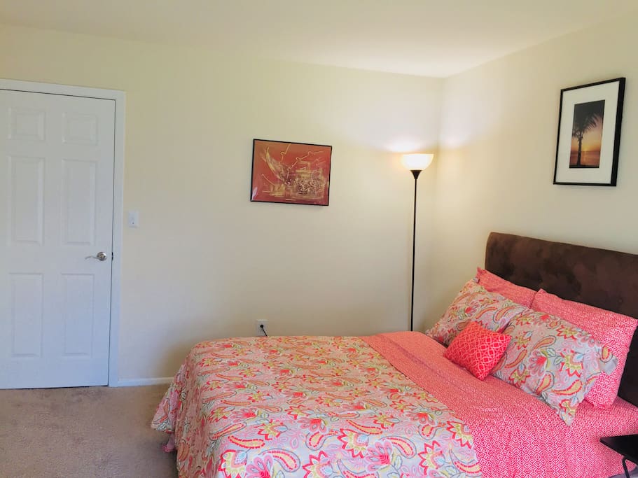 A comfortable bed assorted with a selection of soft and firm pillows