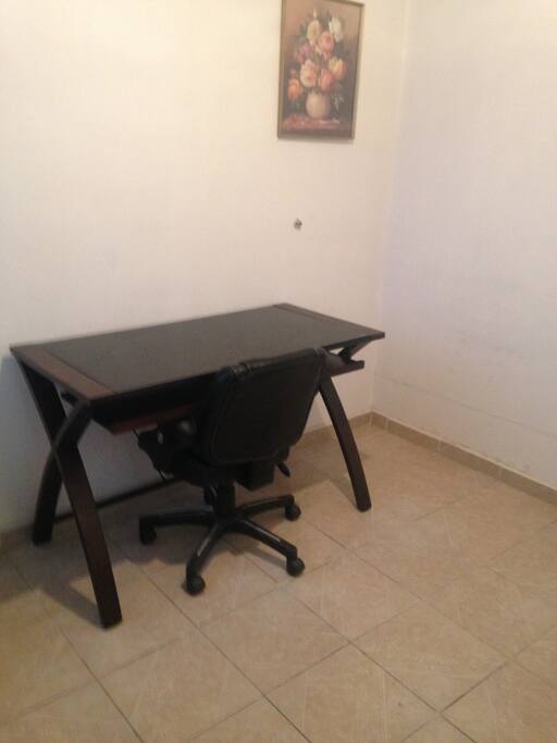 Desk and chair in bedroom 1