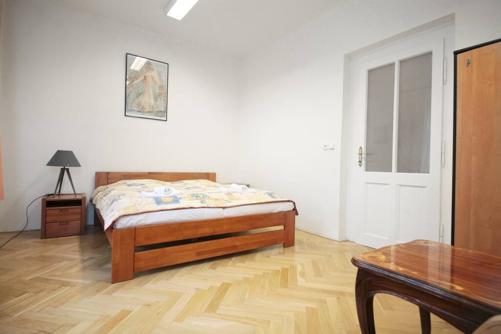 Room #1: double-bed, chairs, wardrobe, table