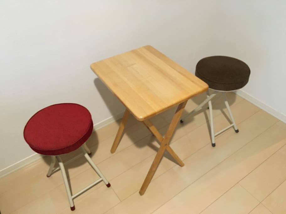 two folding chairs and table for eating , PC, and more ...