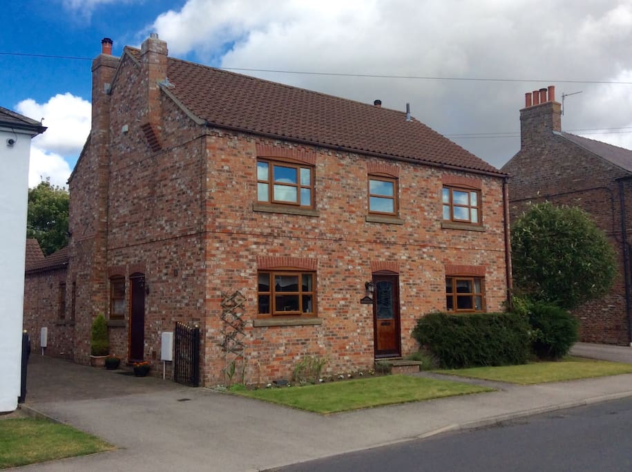 The front of The Old Fold Yard with access to private drive .