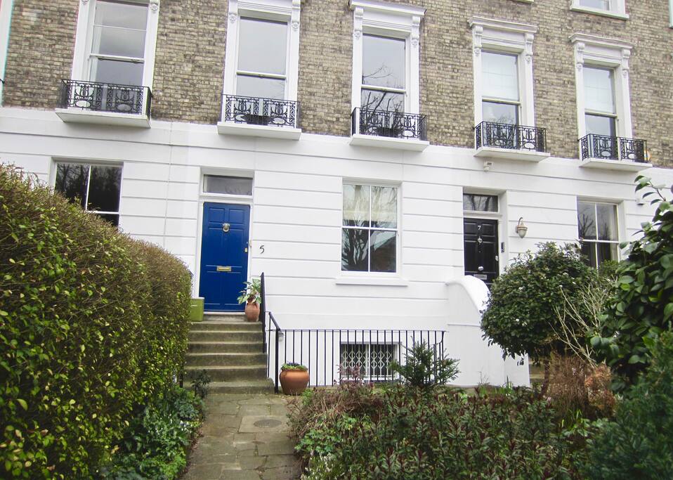 A long front garden (parking available-please enquire) sets the house back from the main road. Note the steps up to the front door.