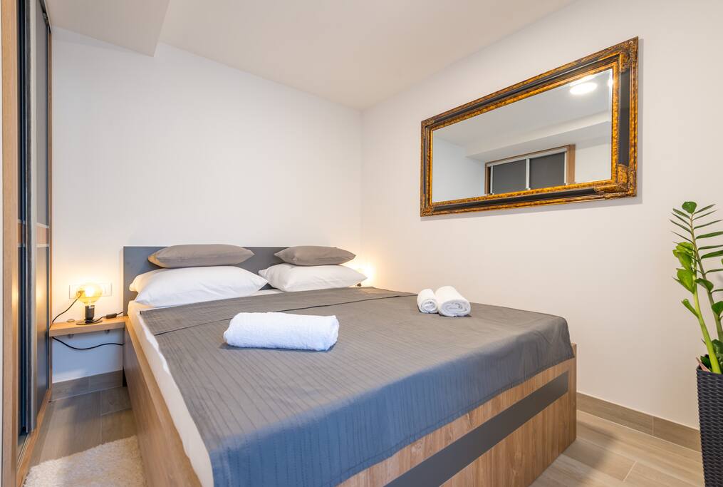 The bedroom with a king-size double bed