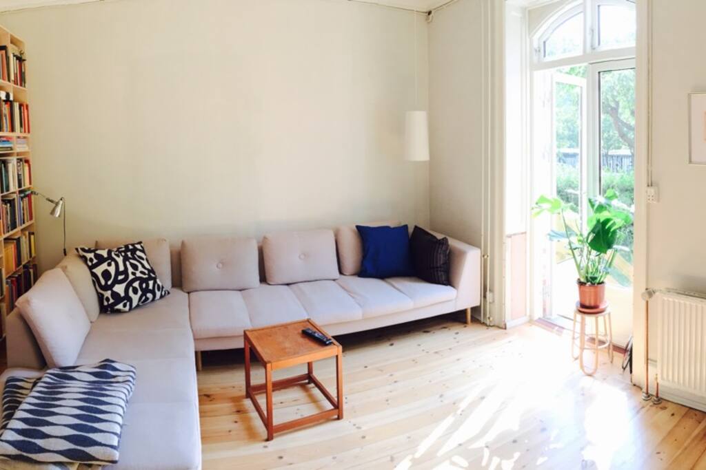 Livingroom. Smart tv with crome cast. Doors to the front garden.