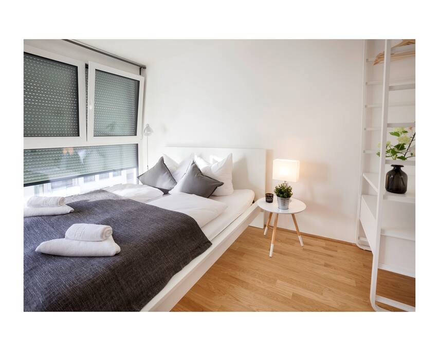 Two separate rooms with one bed each