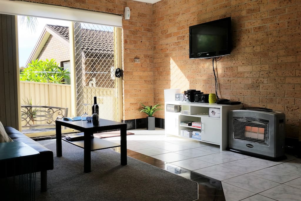 Large living room with comfy couch, gas heating, flat screen HD TV & access to huge DVD library, Nintendo Wii and Platinum Foxtel IQ3 package