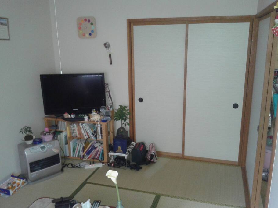 Traditional Japanese room with table and tatami mats different angle