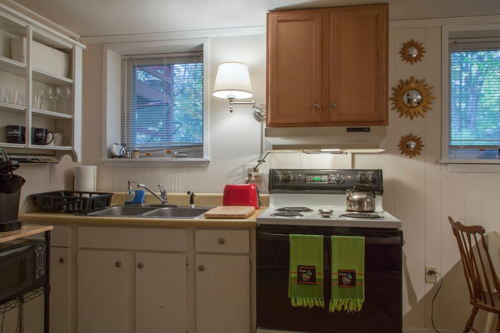 Kitchen area and two of the several windows in the apartment.