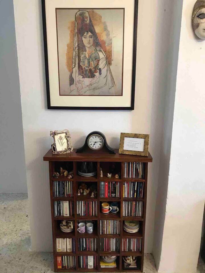 Music library watched over by Picasso’s woman with mantilla