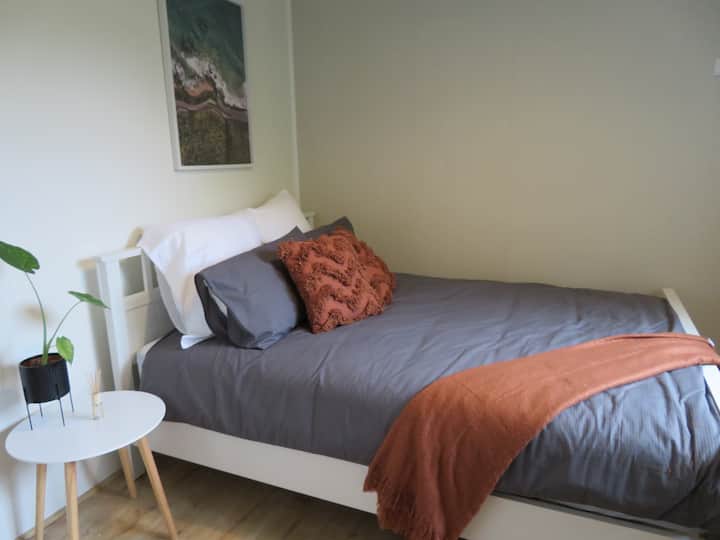 The fourth bedroom is accessible via the back deck, doors from the kitchen & laundry lead to the deck. 
With a queen bed and electric panel heater, it's a cosy and quiet place to spend the night. 