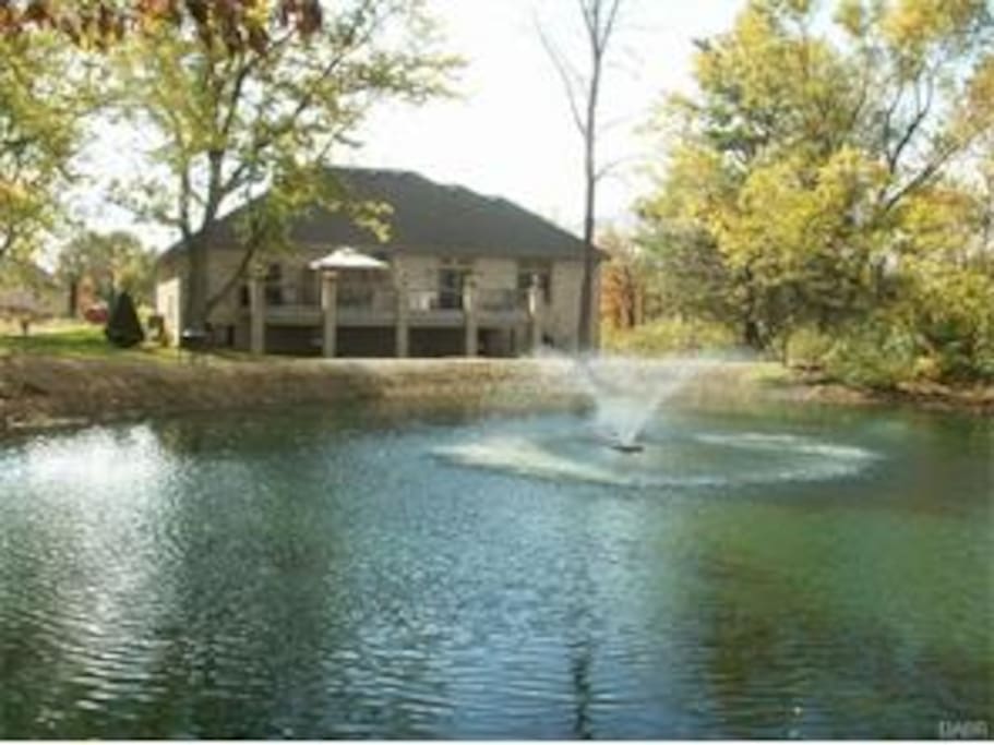 Home sits on 2 acre Private Wooded Lot with a Pond