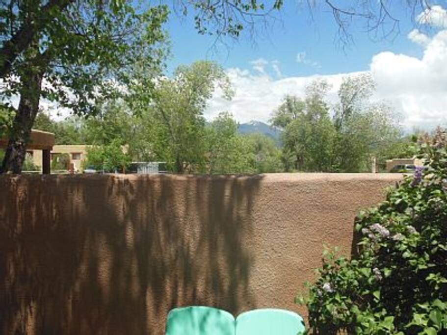 Walled courtyard with mountain view