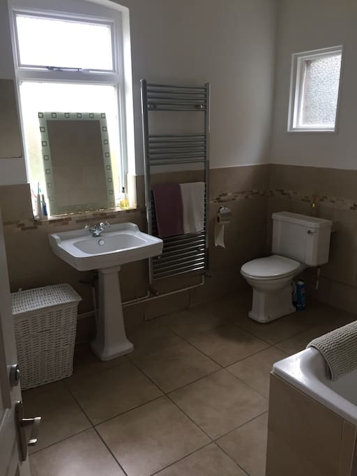 Shared bathroom with instant hot water and storage for your belongings