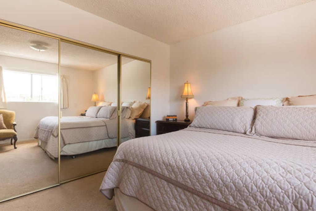King sized bed, according to many guests very comfortable. Plenty of additional blankets in closet if necessary (although pretty rarely needed) which includes iron plus ironing board.