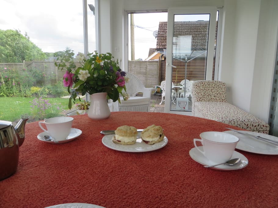 Sun room perfect for scoffing buttermilk scones or for getting the laptop out. Boosted wi fi throughout. (N.B. scones not provided but we can tell you where we get them! - no scones were "injured" during this photography...)