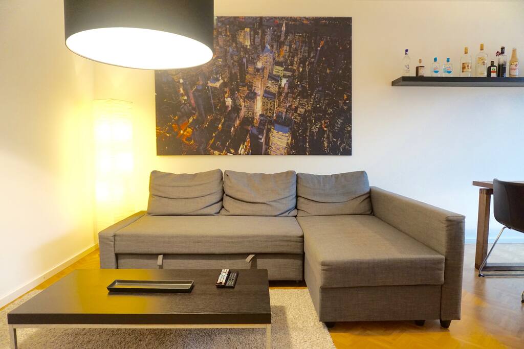 The huge couch is ideal for lazy movie nights.