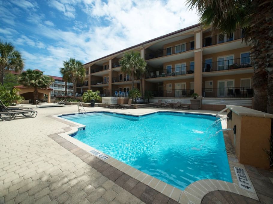 Enjoy the Swimming Pool and Spa with Abundant Deck Space, Lounge Chairs and Shaded Cabana