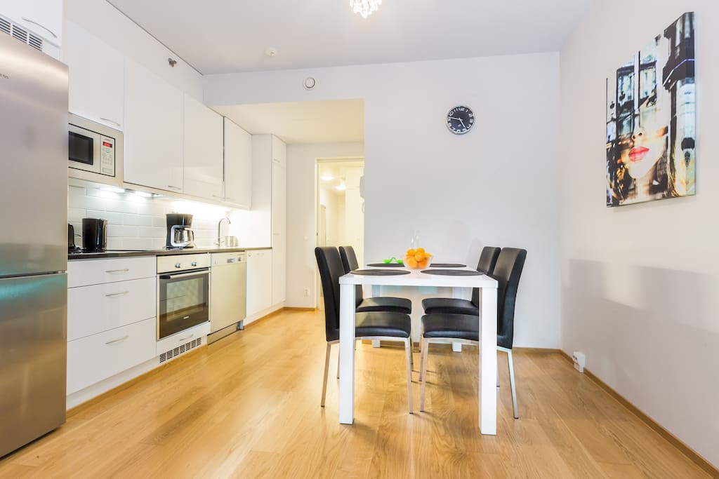 Open kitchen and dinning table for 4.