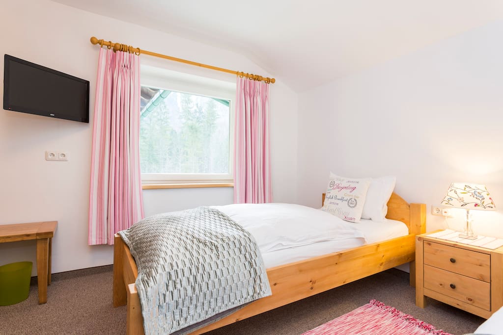 Twin Room, with view over the river and surrounding forest and mountains