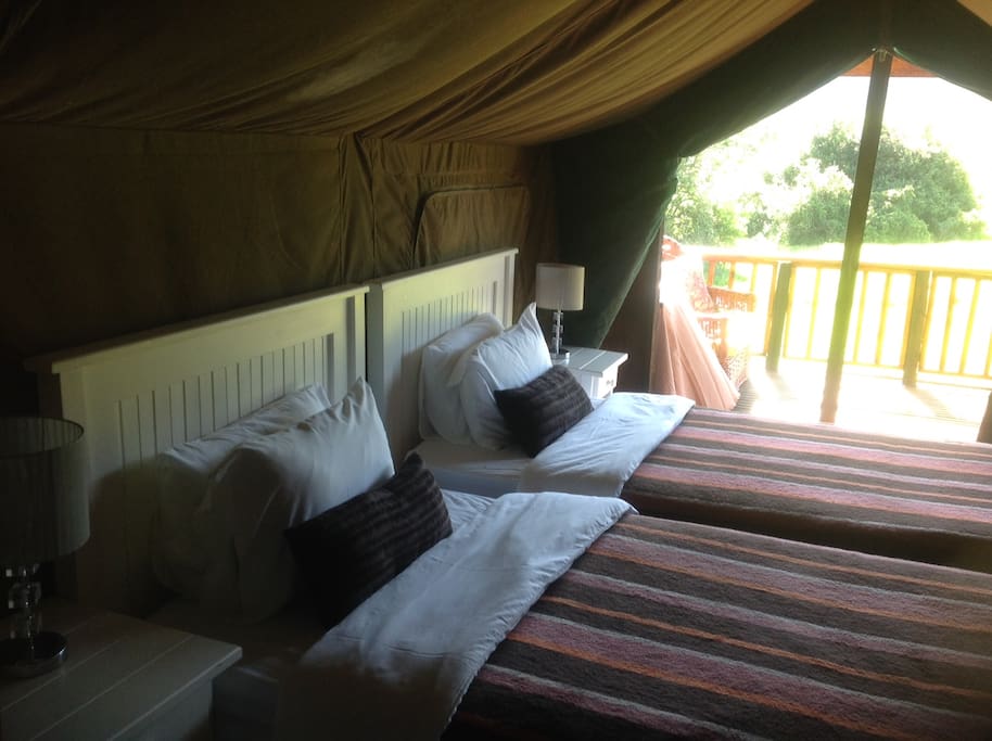 Bedroom 1 with hair dryer, fan, tea and coffee making facilities. Plus private deck.