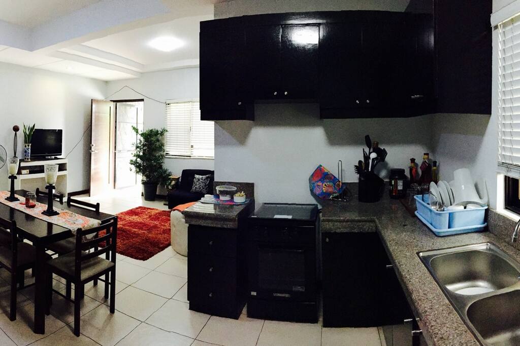 View from the opposite side/kitchen and dining area