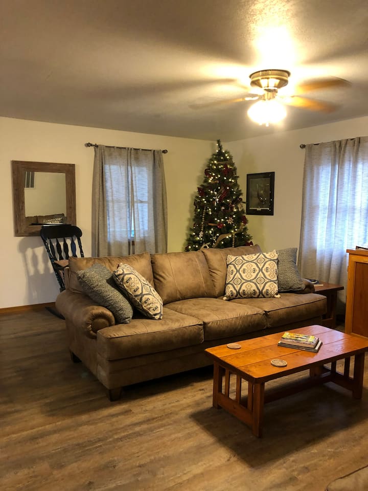 The Bunkhouse living-room is upstairs and has two of these couches. The other couch sits opposite of the one pictured. 