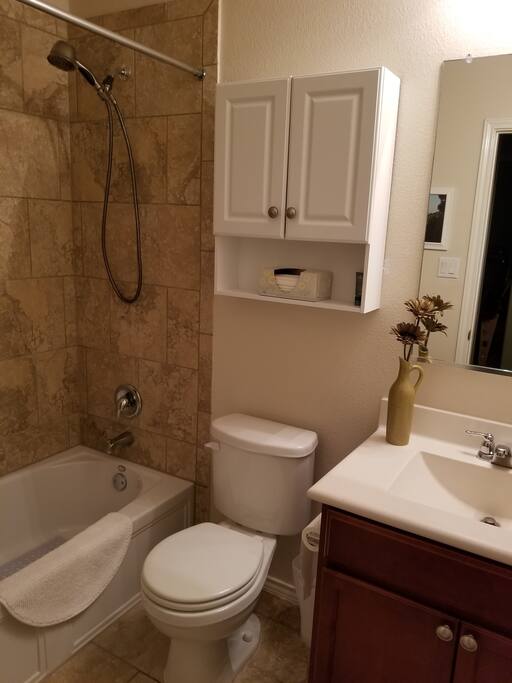 Bathroom dedicated to guests next to the bedroom with full-size tub and all the linens you'll need.
