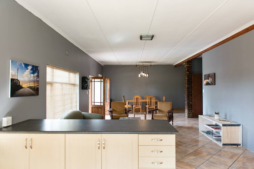 View from the kitchen to the dining room table at the back.