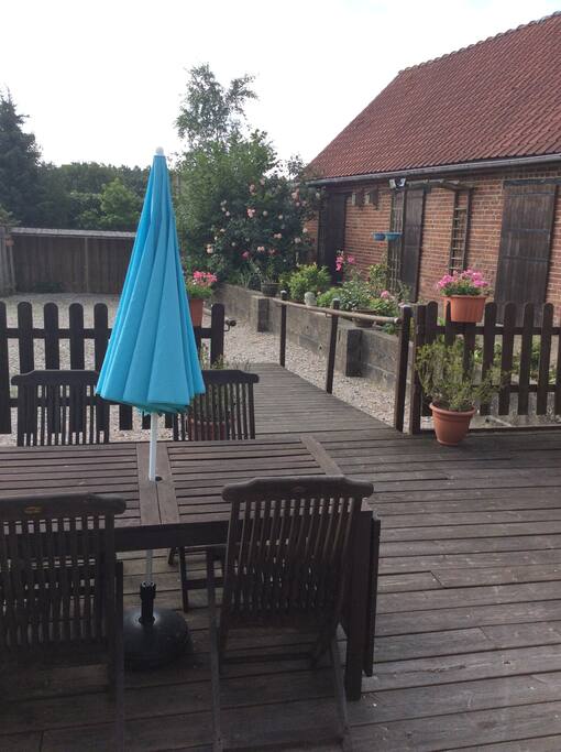 The property is accessed via a ramp and outside decking area