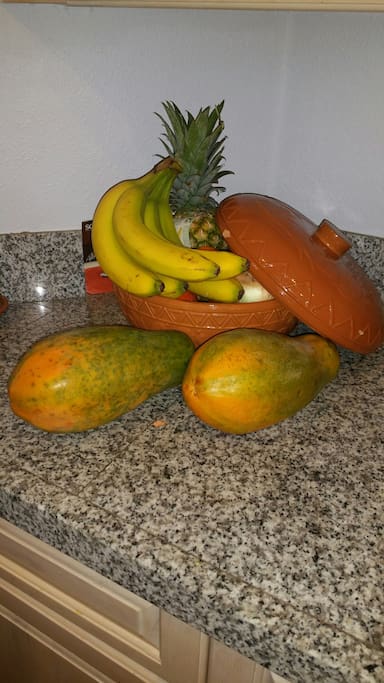 Kitchen - with assorted of fresh fruit and top of the line appliances.