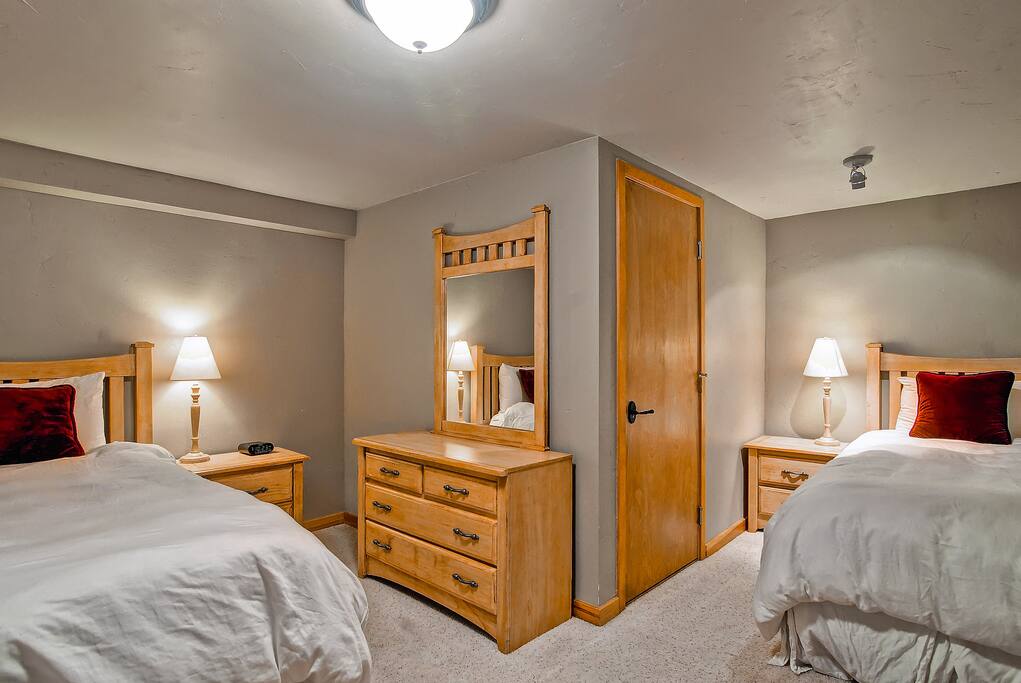 The downstairs #5 has a open doorway, but sleeps 2 comfortably on twin beds.