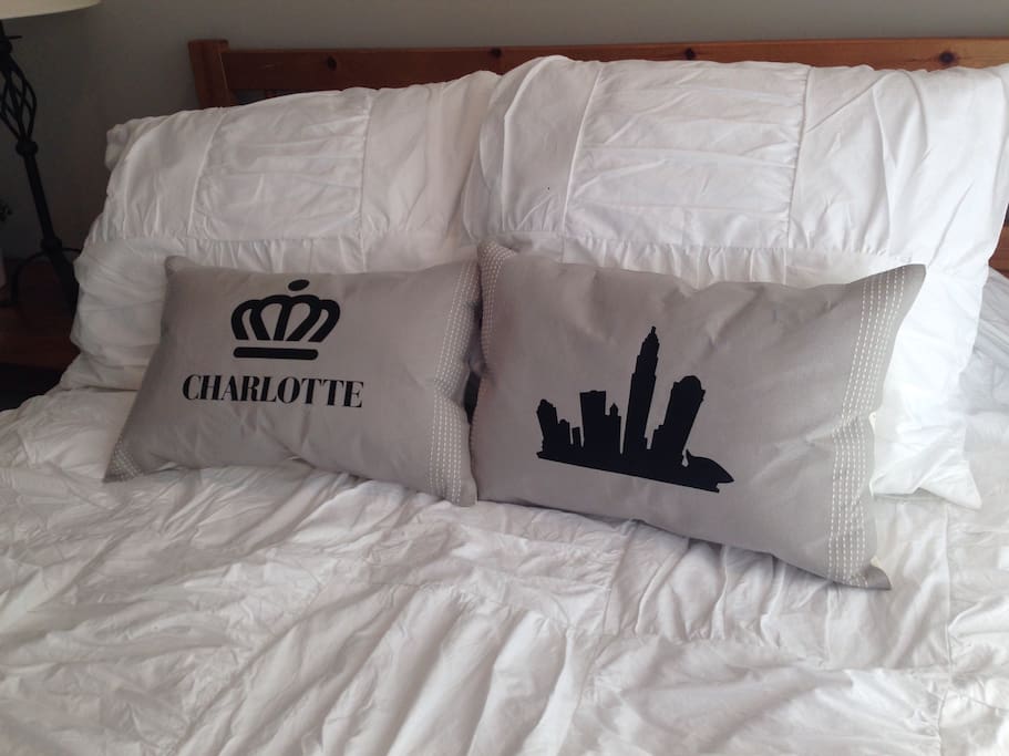 Comfortable memory foam bed with custom Charlotte pillows!