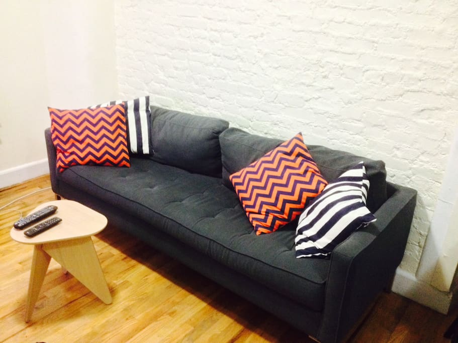 Comfortable couch that could sleep a third person.