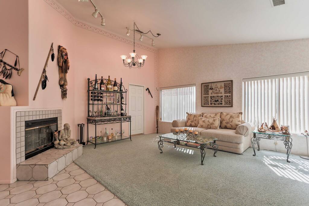 Turn on the dual-sided gas-burning fireplace, grab your favorite book, and take a seat on the plush couch in the living room.