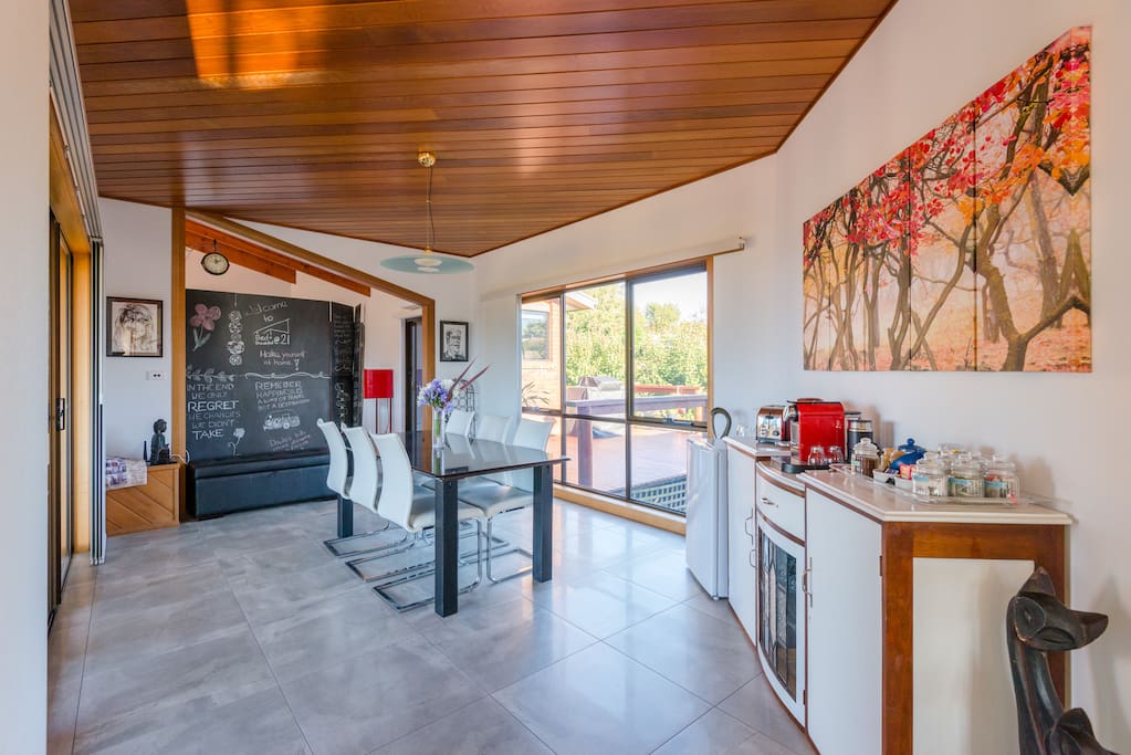 Breakfast area, tea and coffee available at all times. All yours, not shared. The blackboard is a room divider to our home.