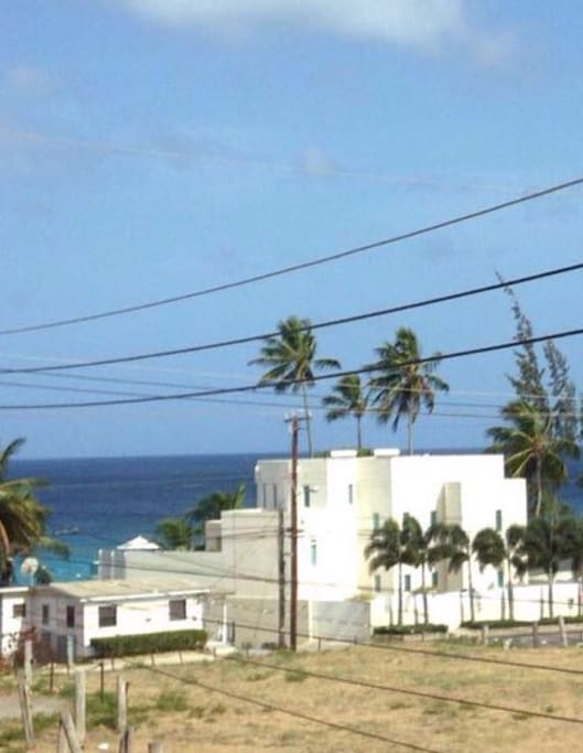 Distance from apartment to the beach is less than two minutes walk,to the right is the Lonestar Restaurant,and to the left is Fairmont Royal Pavilion .