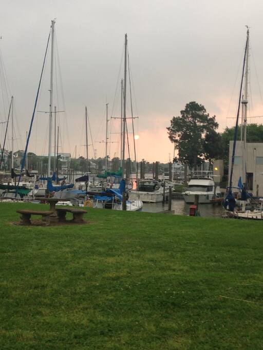 Sunrise on the lawn behind the boat; bbq and picnic area